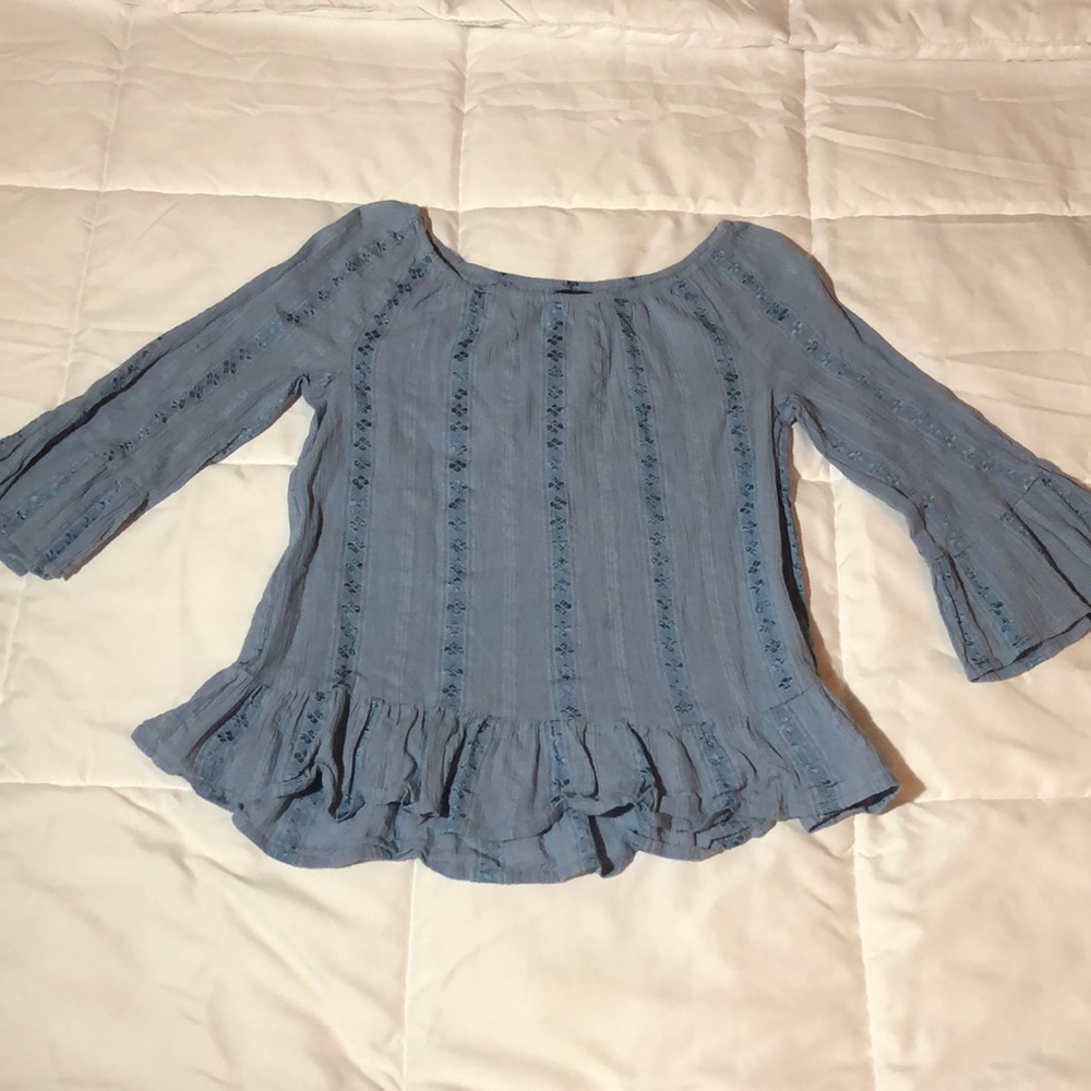 Light blue elbow length shirt